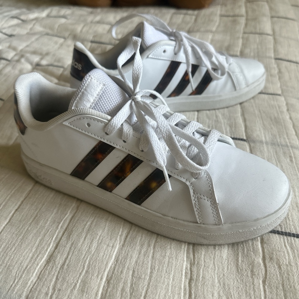 Adidas White Sneakers with Unique Tortoise Shell Stripes